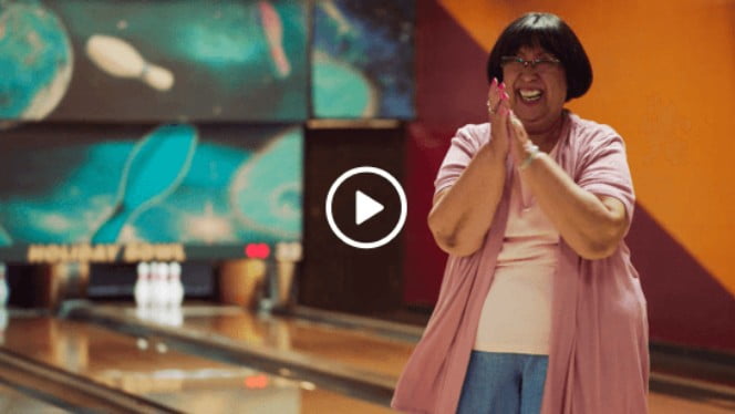 Patient enjoying bowling after ZILRETTA treatment